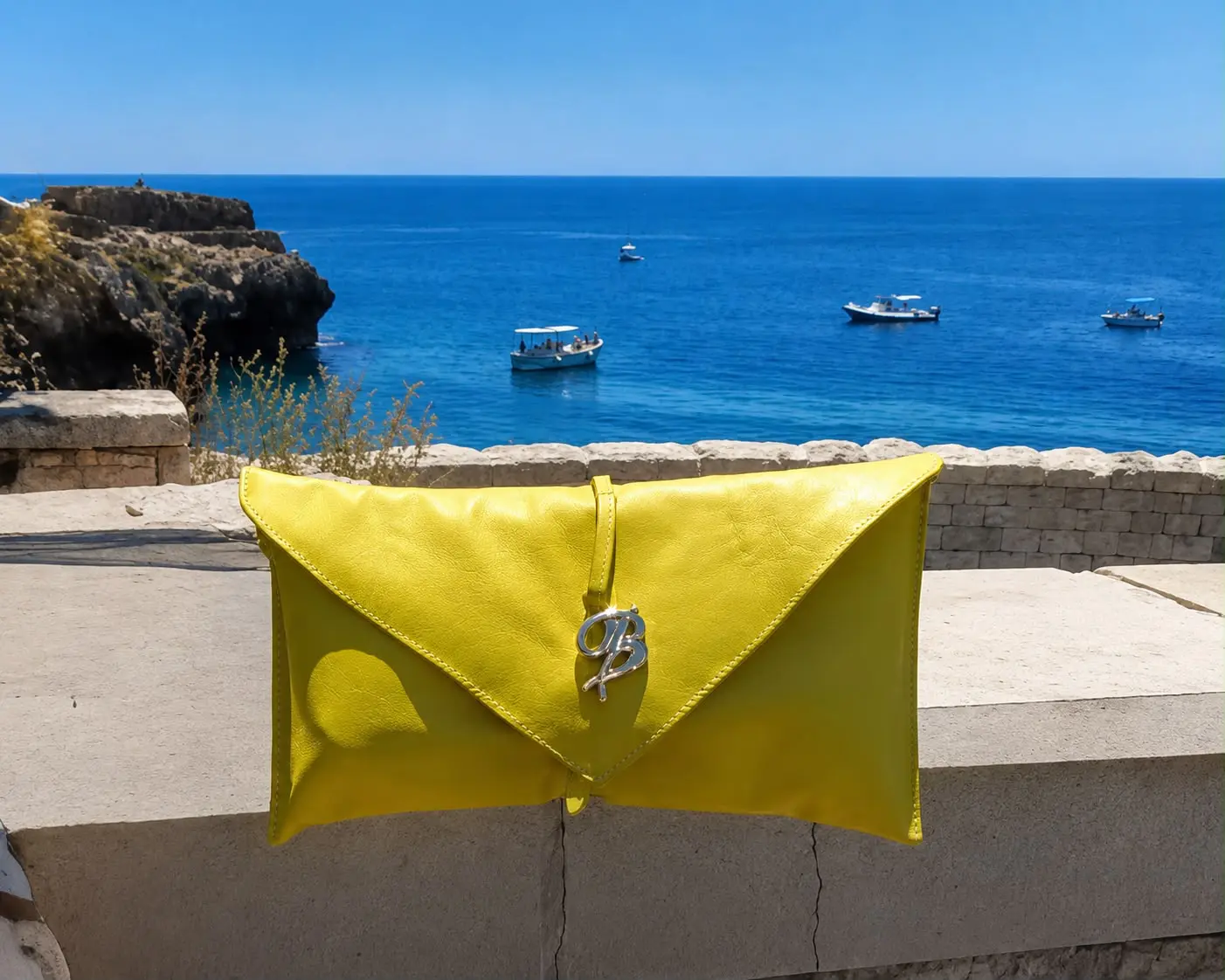 Pochette da donna artigianali fatte a mano in Salento